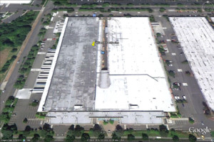 Google Maps aerial view of a finished roof on a 390,000 Square Foot Packaging Facility.