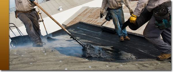 A photo of a commercial roof repair project in Bellevue.