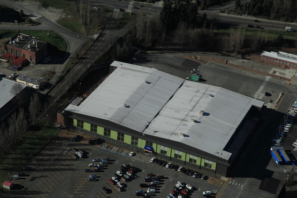 Aerial view of Versico 60 mil TPO single-ply membrane roof on Arena Sports in Seattle.