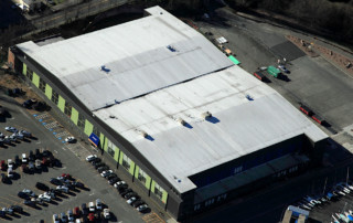 Aerial view of Commercial Roofing Project in Sand Point, WA.