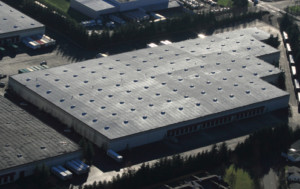 Aerial view of a Malarkey built-up hot tar roof.