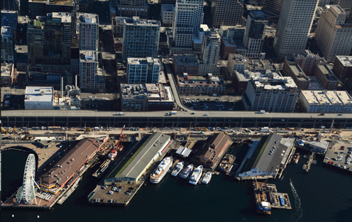 Distant aerial view of a Malarkey Legacy Asphalt Shingle Roofing System at Pier 54 Ivar's in Seattle.