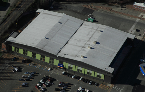 Aerial view of a Versico 60 mil TPO single ply membrane roof for Arena Sports in Seattle.